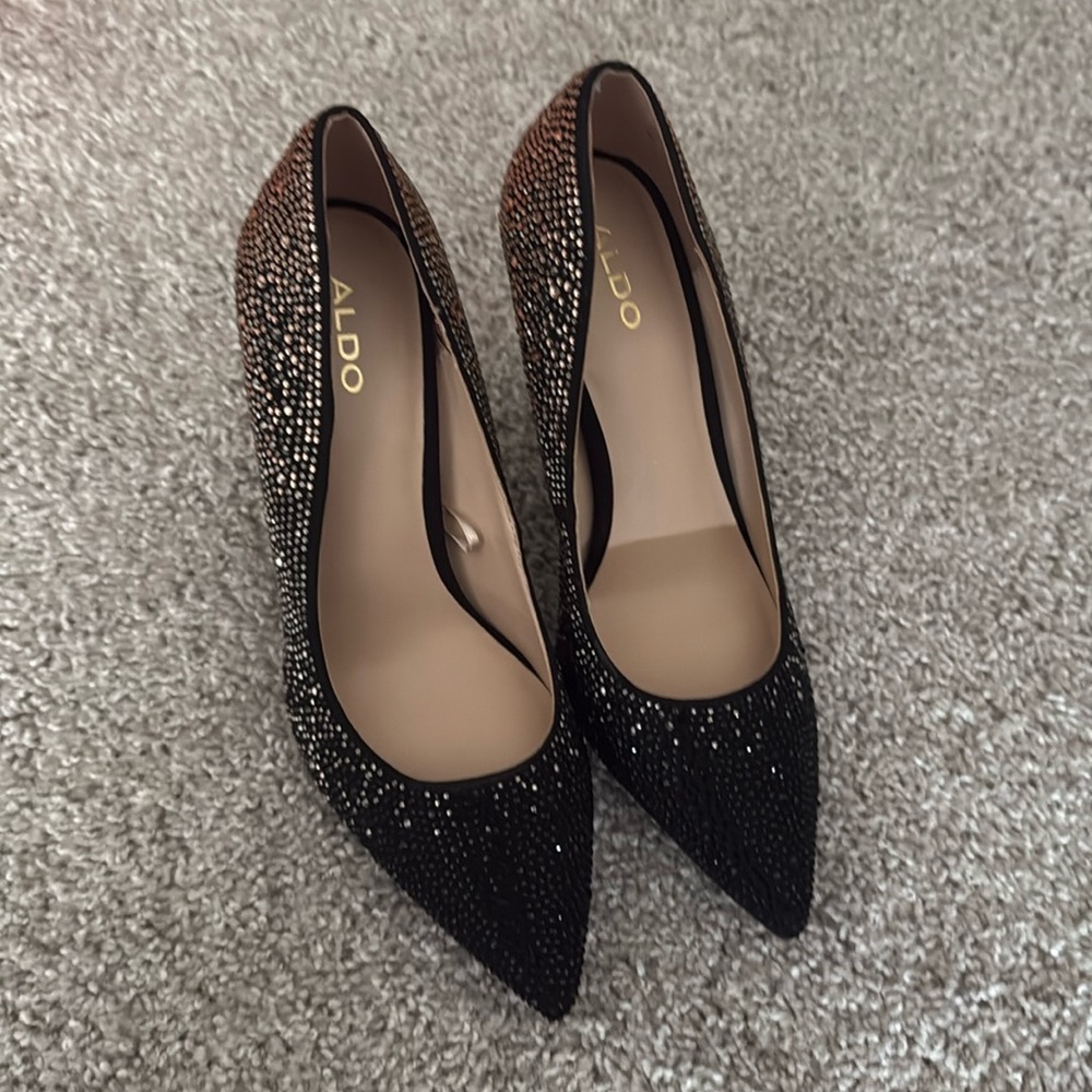 Aldo Stessy pumps featuring a black and rose gold ombré rhinestone embellishment